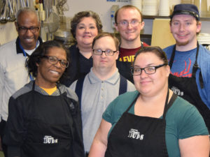 group photo of several Taste Buds team members